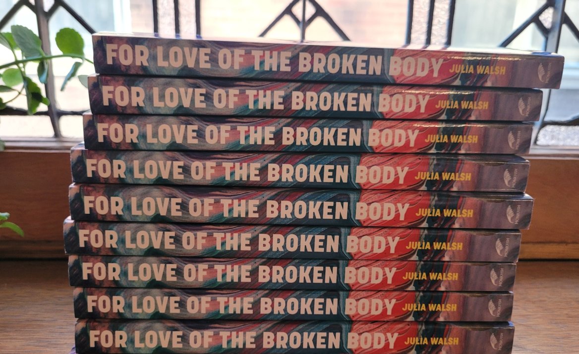 stack of for love of the broken body books