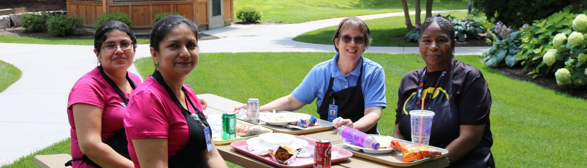 fspa partners in mission on staff sitting around a picnic table