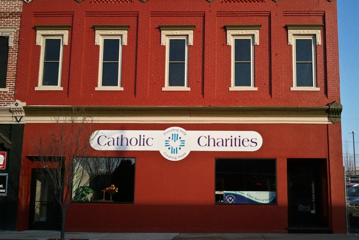 exterior view of the brick building that houses Catholic Charities Warming Center