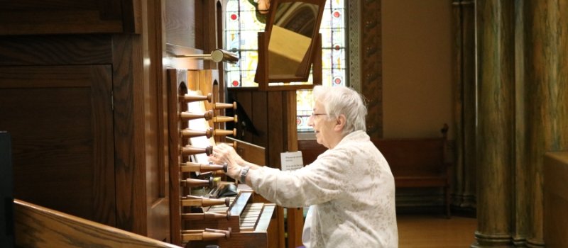 Sister Luanne Durst playing the organ